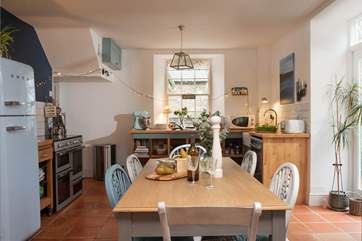 The kitchen is a lovely and cosy spot.