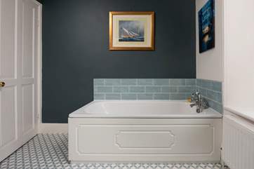 The super stylish family bathroom is located on the first floor.