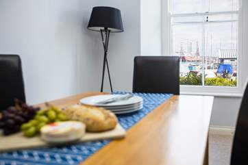 The view from the dining-table to the docks is quite dramatic and ever-changing.