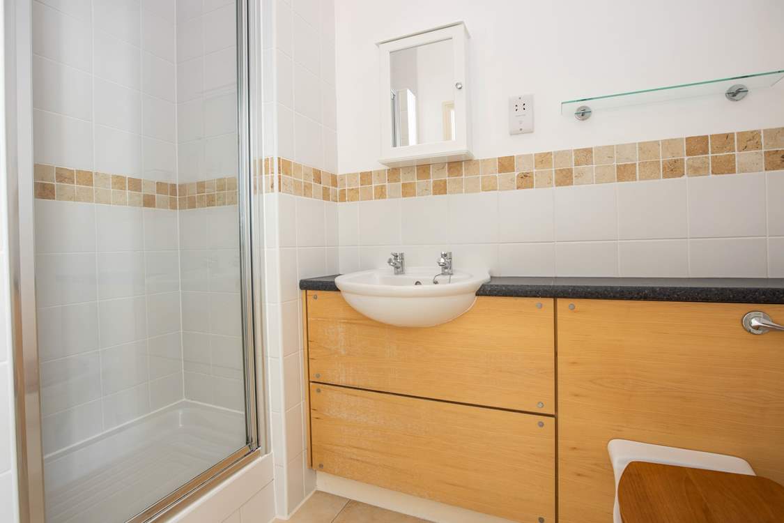 The en suite shower-room to the main bedroom.