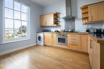 The large kitchen also has a breakfast table for more casual meals.
