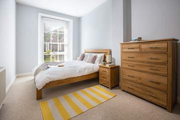 The main bedroom is at the back of the property.