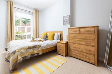 The master bedroom has a king-size bed and en suite shower-room.