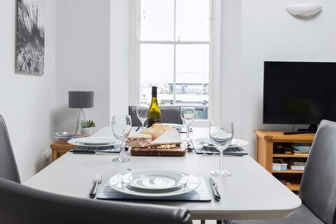 This dining-table is the perfect spot for a formal meal together.