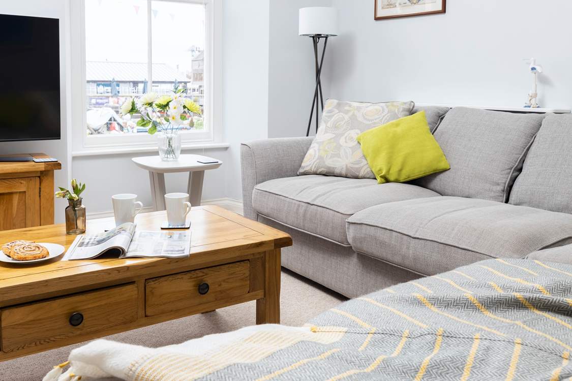 There is plenty of room for everyone on the large corner sofa.