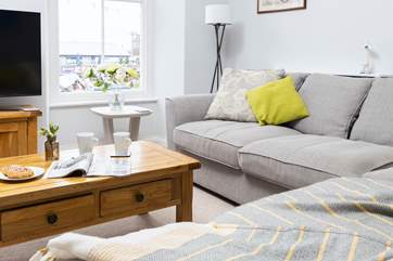 There is plenty of room for everyone on the large corner sofa.