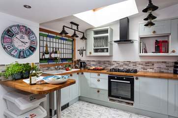 The light and airy kitchen is the perfect place for cooking up a feast with the local catch of the day.
