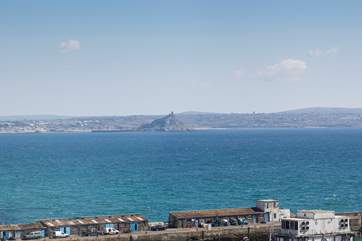 Watch the fishing boats come and go as the sun moves over the iconic St Michael’s Mount