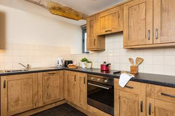 A fully equipped kitchen awaits.