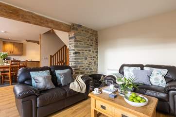 The living-room offers a place for everyone even the family pooch!