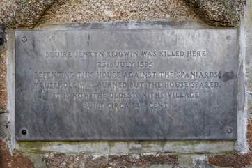 This iconic plaque is located on the wall outside Keigwin Manor.