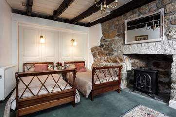 This stylish bedroom is located on the ground floor.
