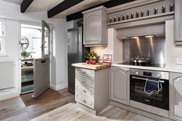 Open the stable-door from the kitchen and step outside, where you will find an outdoor picnic table.