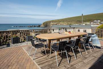 Dining al fresco is a must in this glorious beachside location.