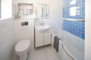 The family bathroom on the ground floor is located next to bedroom two.