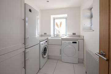 The utility-room is the perfect space for storing your wetsuits and beach wear.