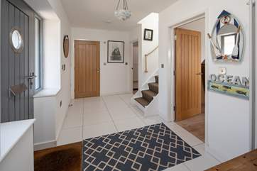 The entrance hall links the ground floor perfectly. The stairs to bedroom three lead up from the entrance hall.