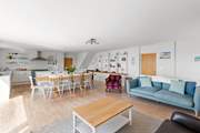 Dining, relaxing and cooking together is what makes this family home so special.