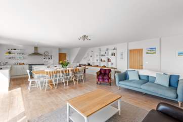 Dining, relaxing and cooking together is what makes this family home so special.