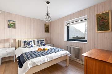 Bedroom one has a lovely seaside feel.