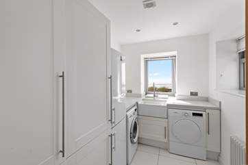 The utility-room is the perfect space for storing your wetsuits and beach wear.