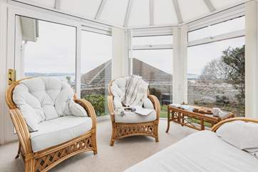 The conservatory is a great place to relax with a good book. What a stunning backdrop.
Please note there is a step out of the conservatory. Please take care when stepping directly out of the conservatory.