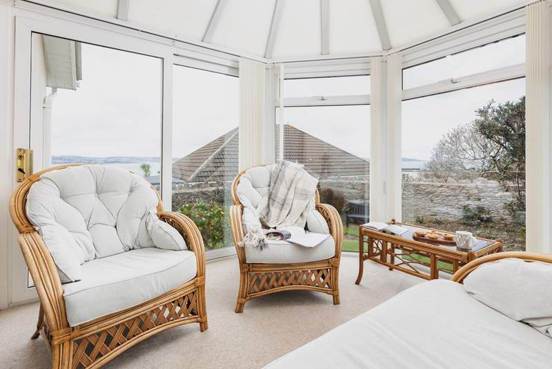 The conservatory is a great place to relax with a good book. What a stunning backdrop.
Please note there is a step out of the conservatory. Please take care when stepping directly out of the conservatory.