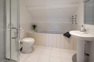 The bathroom is modern and bright.