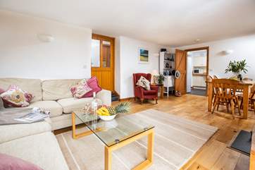 There is plenty of space to relax in the open plan sitting/dining-room.