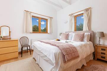 With dual-aspect windows, a good night's sleep is assured in the main bedroom.
