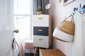 You will find some clever storage options in the little bedroom.