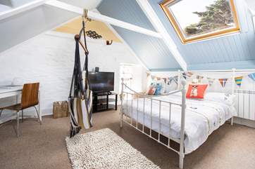 At the top of the house you will find the third double bedroom.