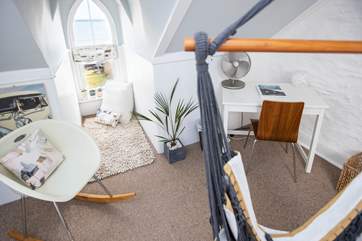 Sit and enjoy the sea views from this top floor bedroom, is the tide out yet?