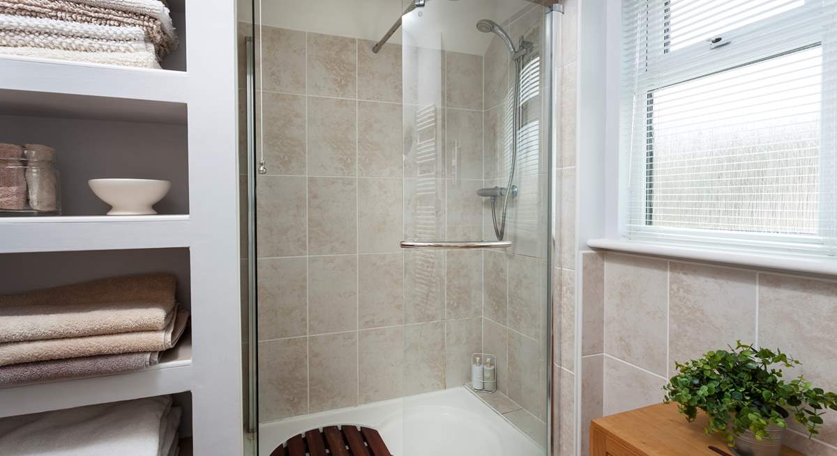 The shower-room on the first floor has a spacious shower cubicle.