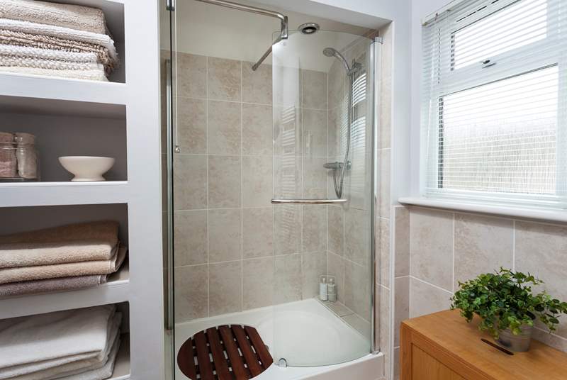 The shower-room on the first floor has a spacious shower cubicle.
