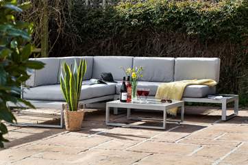 Comfy seating perfect for relaxing in the garden after a day out exploring.