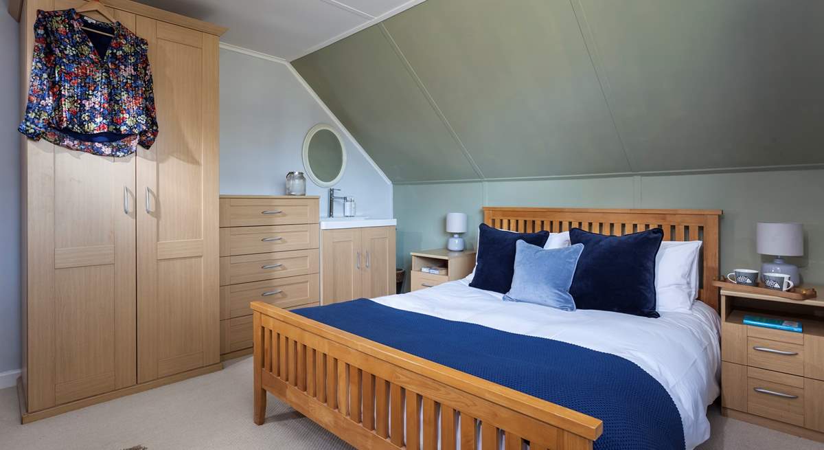 Bedroom 3 has plenty of storage for your belongings and a handy sink in the room.