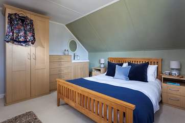 Bedroom three has plenty of storage for your belongings and a handy sink in the room.