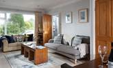 Comfy sofas and quality furnishings surround you. - Thumbnail Image