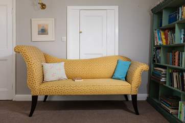 Tuck away on the chaise lounge with a good book.