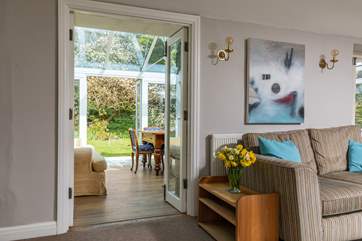 The living space has a lovely flow and plenty of room for everyone.
