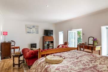 This bedroom also has a patio door which opens to a small terrace which catches the sun all day - perfect for a quiet coffee perhaps (Bedroom 1).