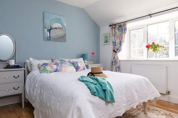 The Flower Room is decorated in soft tones for a calming night's sleep (Bedroom 3).