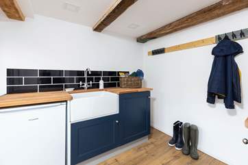 The boot room on the ground floor is perfect for welly boots and sandy towels.