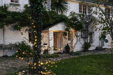 Twinkling lights lead you to your winter wonderland.
