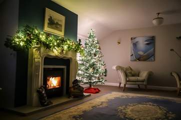 Enjoy a glass of mulled wine by the roaring fire.