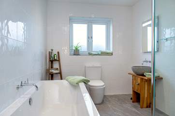 The family bathroom has a double ended bath, perfect for a long holiday soak.
