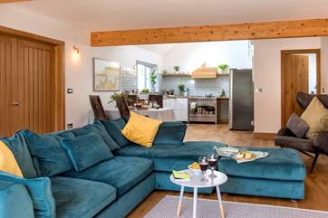 The spacious open plan living-room.