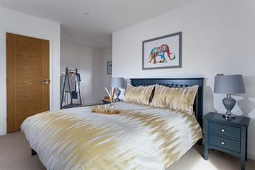 The main bedroom with fabulous en suite oozes luxury.