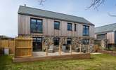 The simple gardens surround the rear of the house and offer plenty of space for cooking and dining outside (there’s a great barbecue for the outdoor chef).  - Thumbnail Image